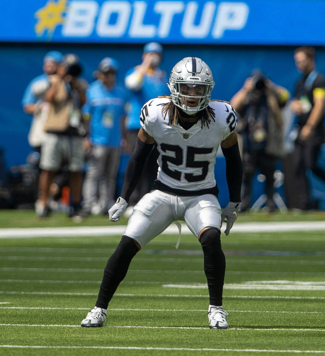 Raiders safety Tre'von Moehrig (25) defends on the field during the first half of an NFL game a ...
