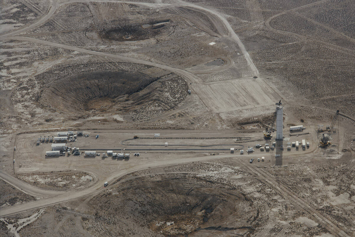 Subsidence craters from earlier underground tests dot landscape at the Nevada National Security ...