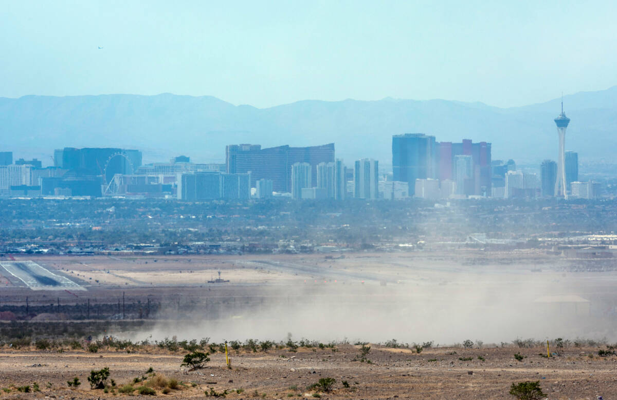Dust kicks up north of Nellis AFB as the Clark County Department of Environment and Sustainabil ...