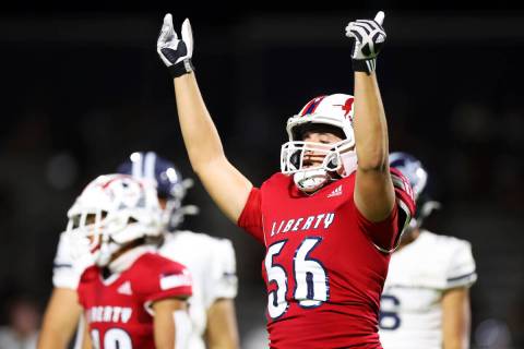 Liberty's Derek Jones (56) reacts after getting a tackle in the first half of a football game a ...