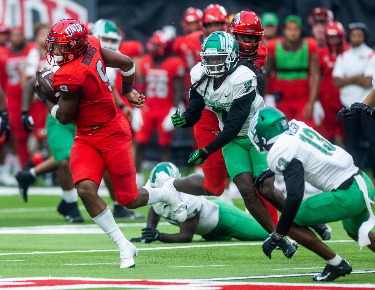 UNLV Rebels running back Aidan Robbins (9) finds some running room from the North Texas Mean Gr ...