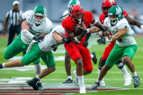 UNLV Rebels running back Aidan Robbins (9) looks for the end zone after breaking past North Tex ...