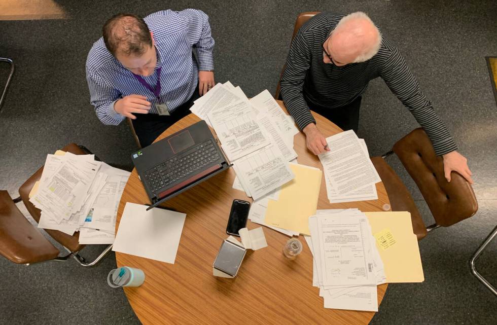 Investigative reporters Arthur Kane, left, and Jeff German work on a story at the Review-Journa ...
