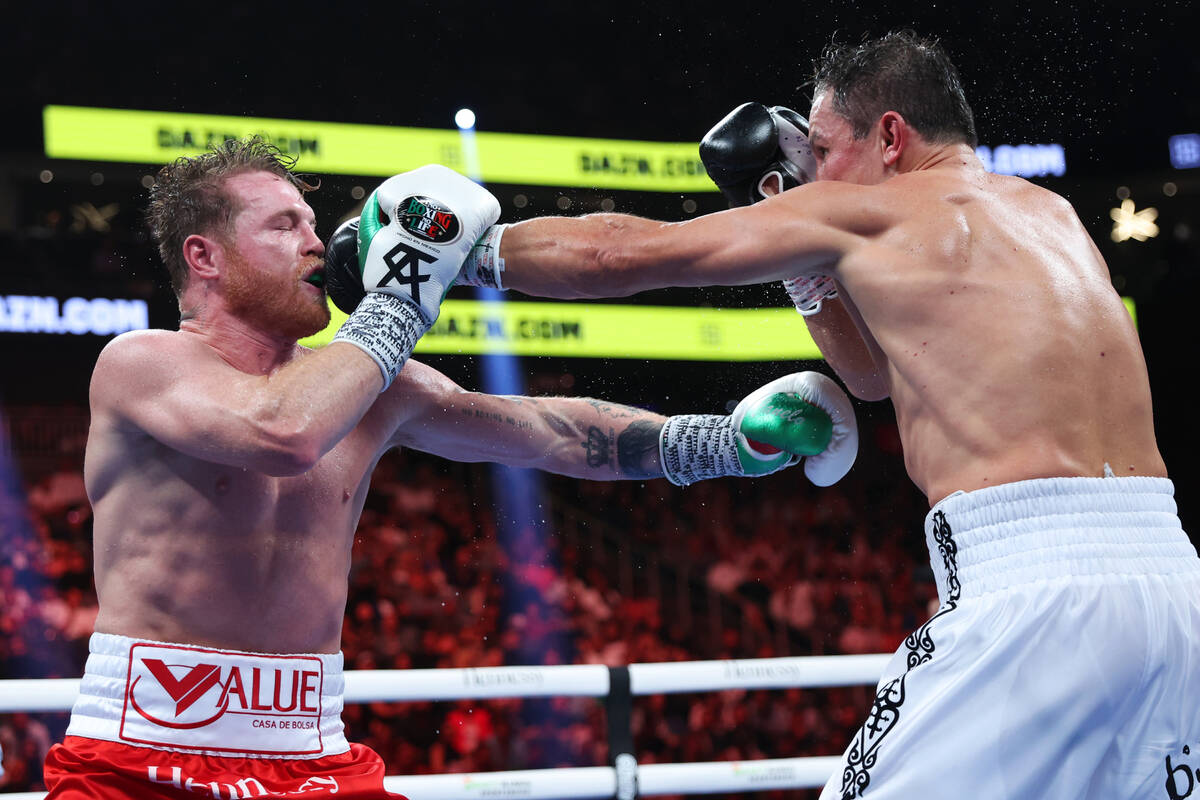 Gennadiy "GGG" Golovkin, right, connects a punch against Saul "Canelo" Alva ...