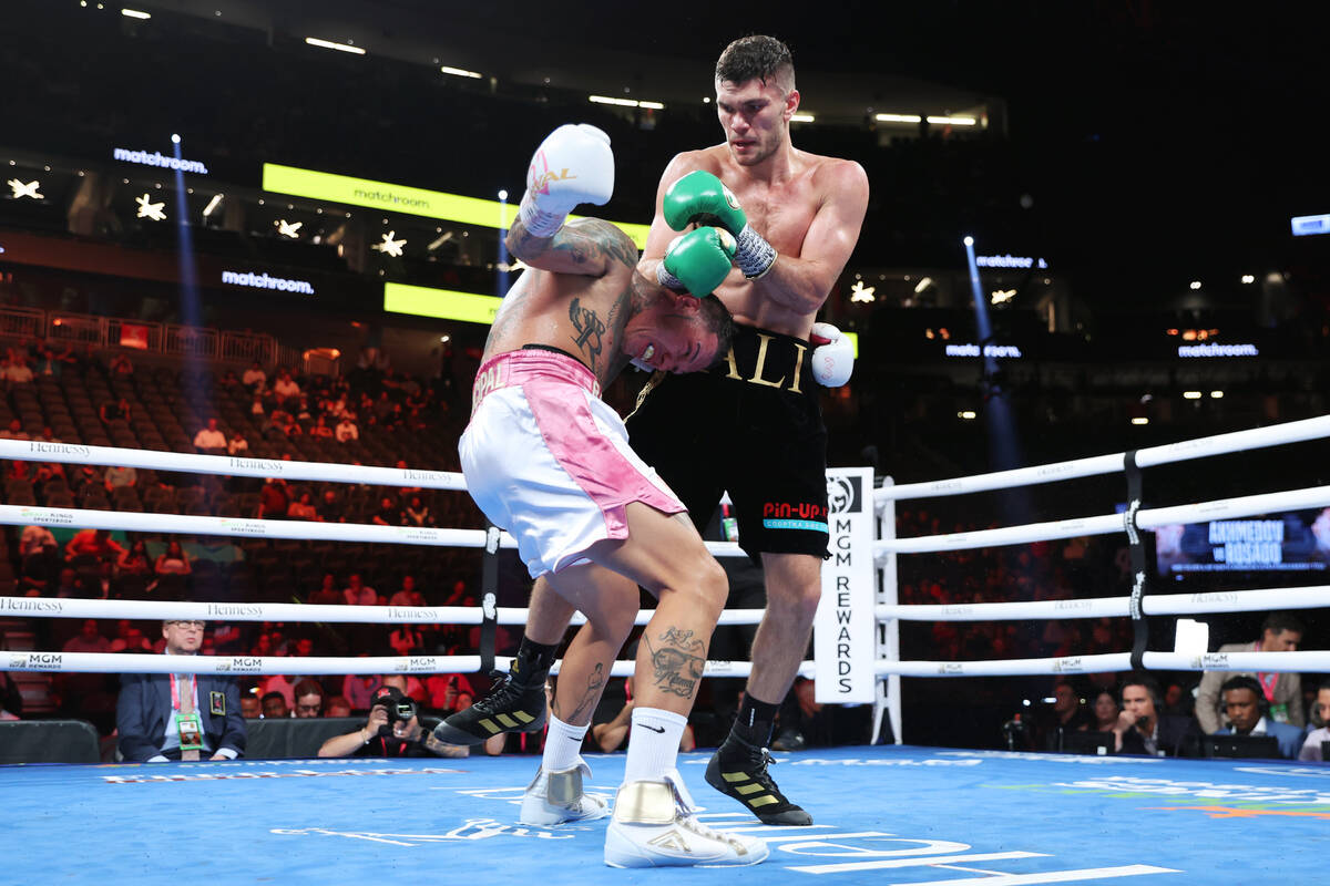 Gabriel Rosado, left, bottles Ali Akhmedov, in the sixth round of a super middleweight fight at ...