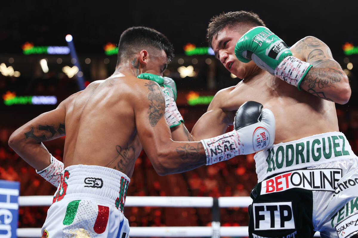 Jesse "Bam" Rodriguez, right, connects a punch against Israel Gonzalez, in the second round of ...