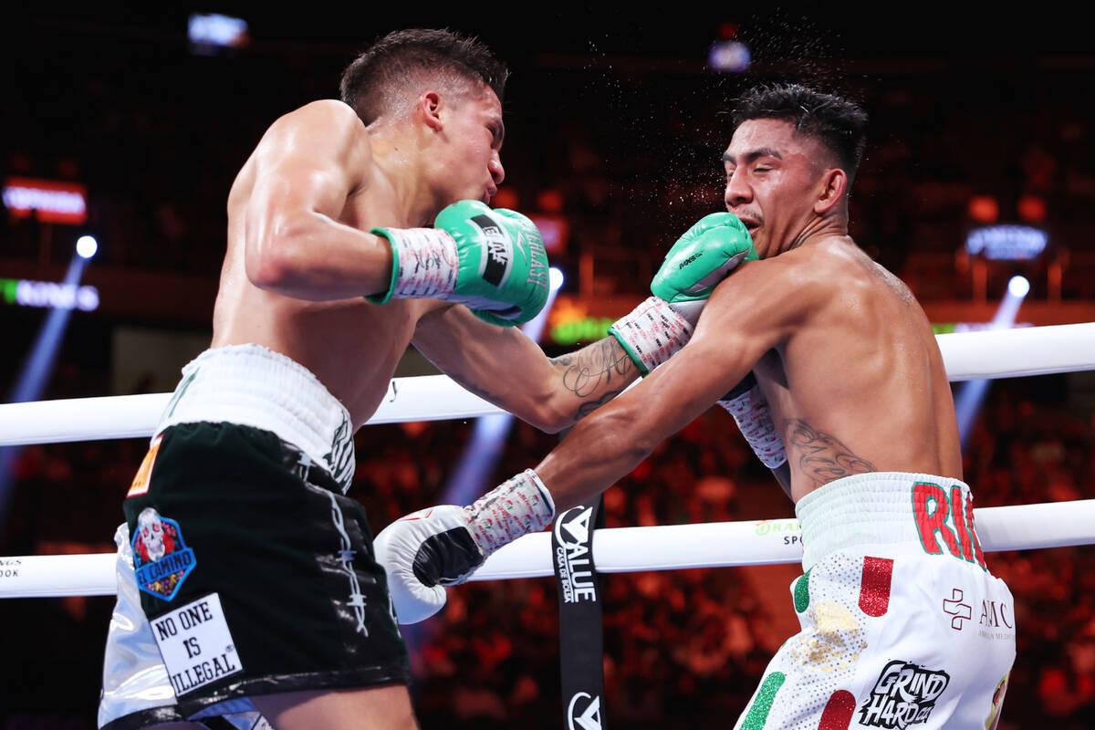 Jesse "Bam" Rodriguez, left, connects a punch against Israel Gonzalez, in the fifth round of a ...