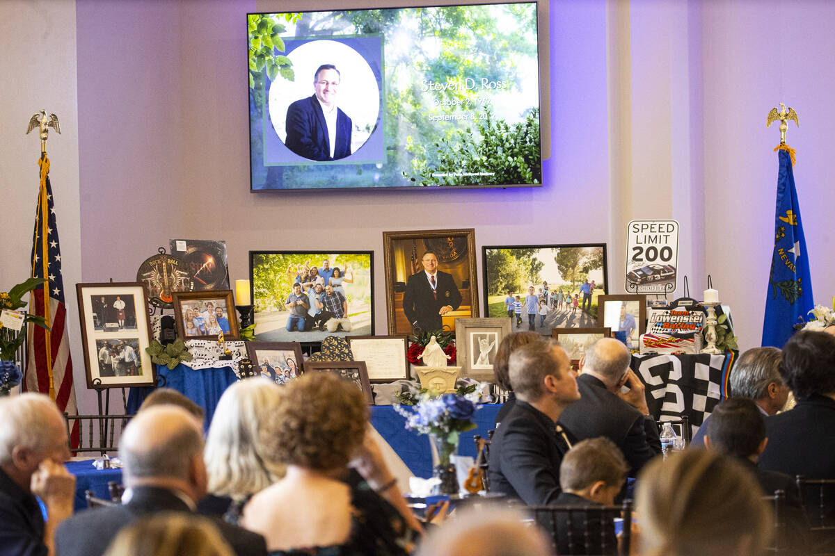 Images are seen on display during a funeral service for Las Vegas City Councilman Steve Ross at ...