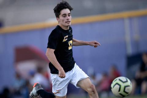 Durango’s Aleksandar Benov (17) runs to keep the ball in bounds during a high school soccer g ...