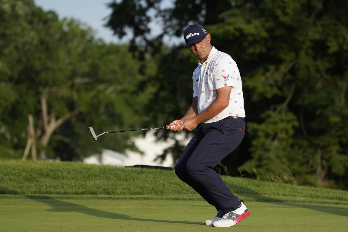 Gary Woodland reacts after a missed putt on the eighth hole during the first round of the U.S. ...