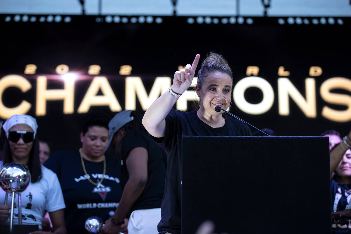 Las Vegas Aces head coach Becky Hammon gives a speech during a parade to honor the team’ ...
