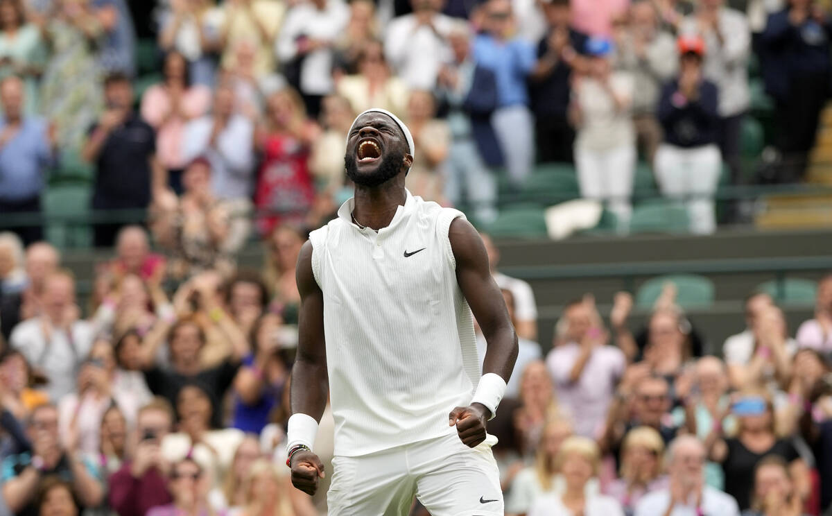 Frances Tiafoe of the U.S. celebrates after winning the men's singles match against Stefanos Ts ...