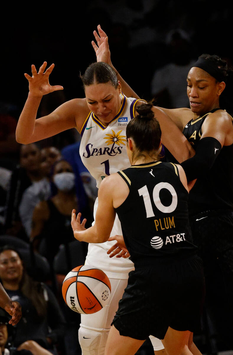 Los Angeles Sparks center Liz Cambage (1) looses a ball against Las Vegas Aces guard Kelsey Plu ...