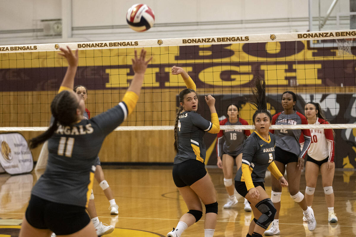 Bonanza’s Gaby Rose (11) goes for the ball while teammates Clara Jennings (4) and Sheyen ...