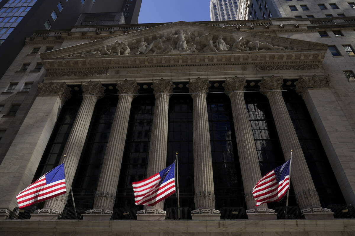 American flags fly outside the New York Stock Exchange, Friday, Sept. 23, 2022, in New York. St ...