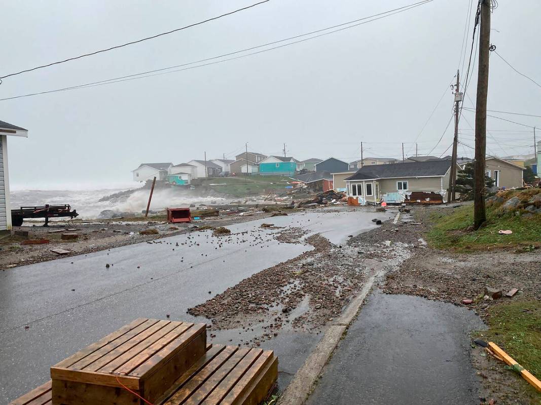 This photo provided by Wreckhouse Press shows damage in Port aux Basques, Newfoundland and Labr ...