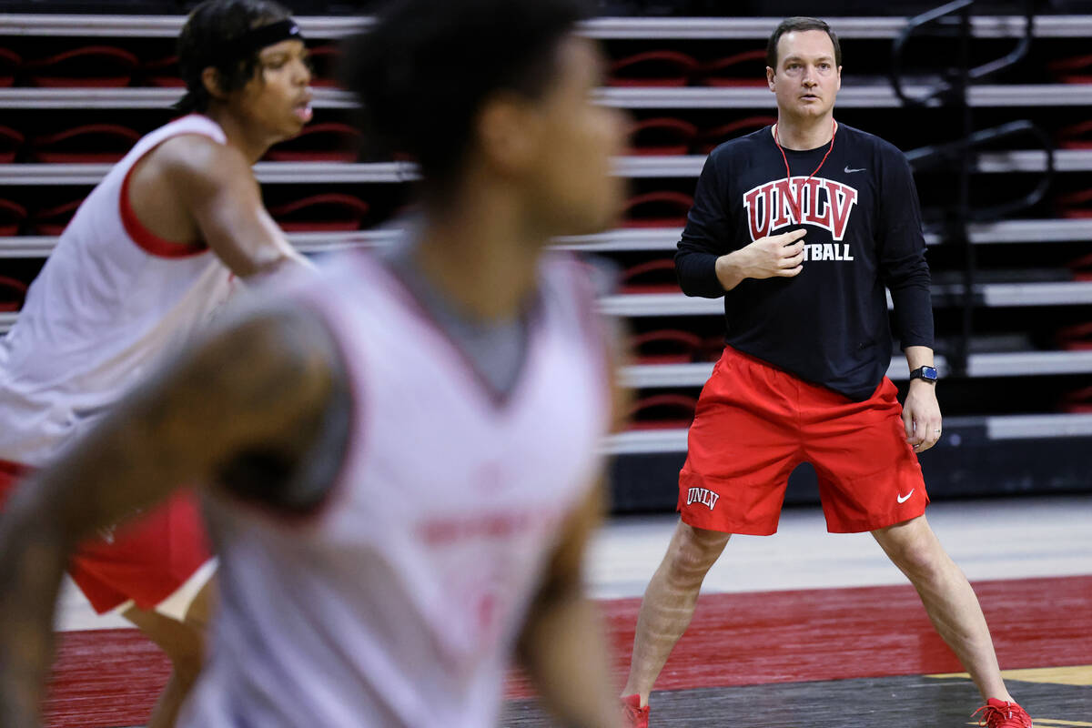 UNLV basketball coach Kevin Kruger watches his players during practice at Thomas & Mack Cen ...