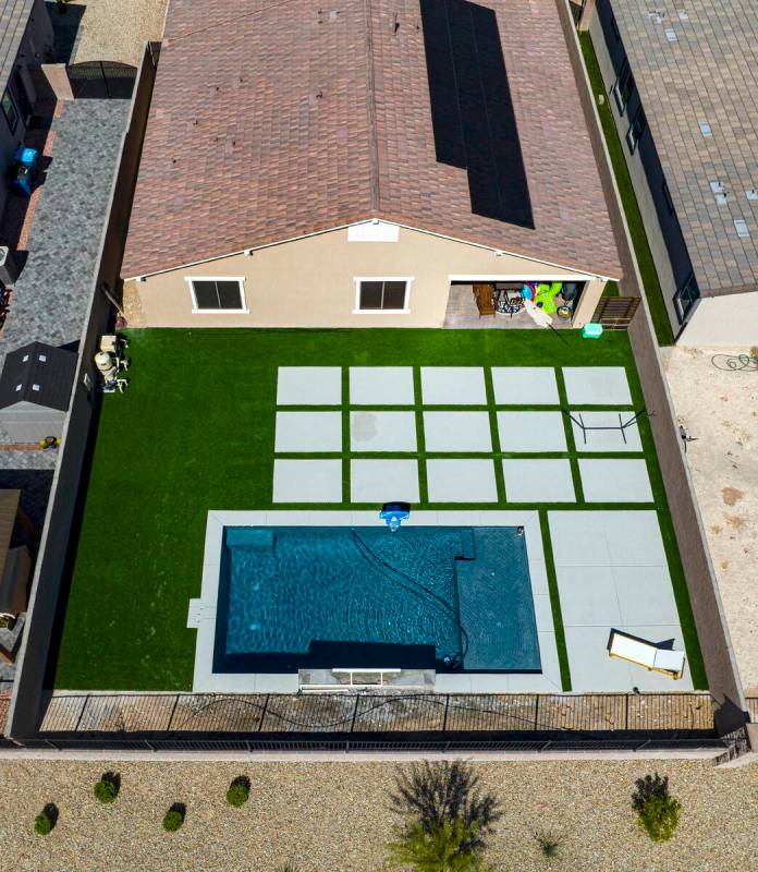 An aerial view of the backyard of the house where police officers shot a man is photographed, o ...