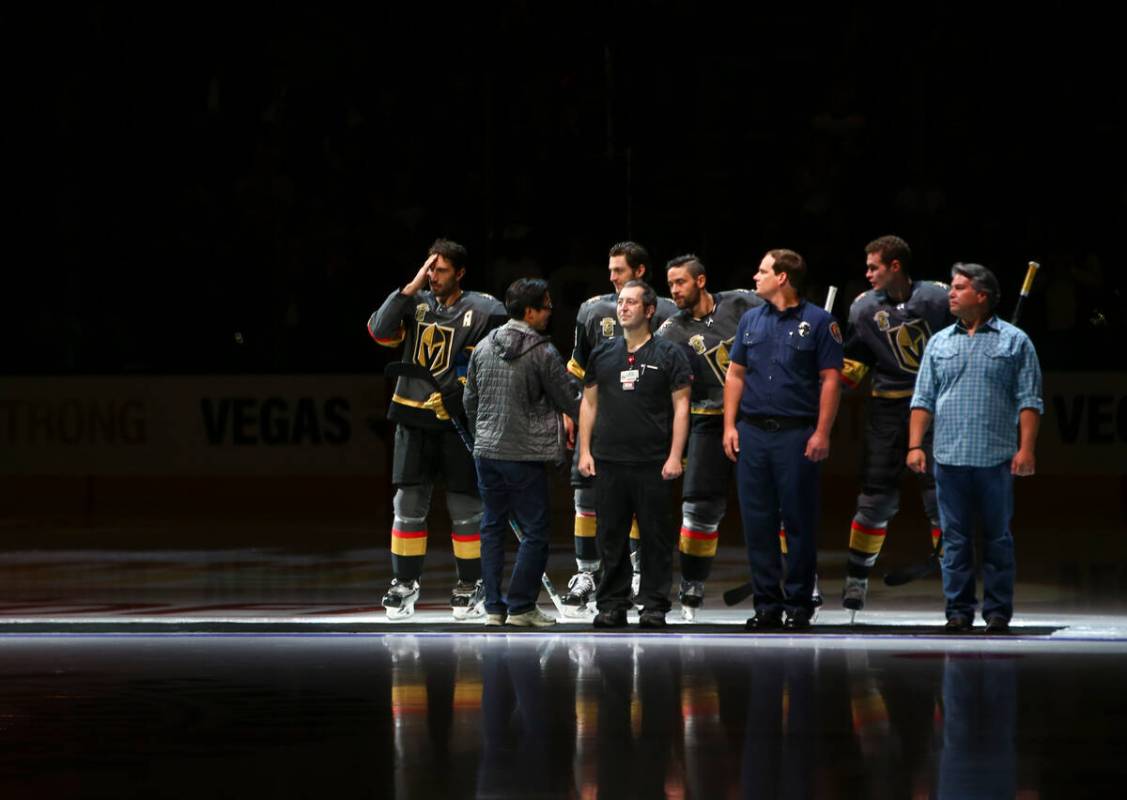 Members of the Vegas Golden Knights are introduced with first responders before playing the Ari ...