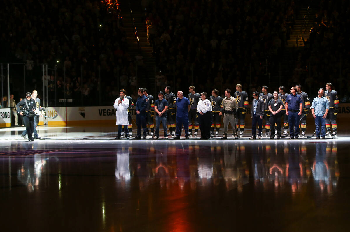 Members of the Vegas Golden Knights are introduced with first responders before playing the Ari ...