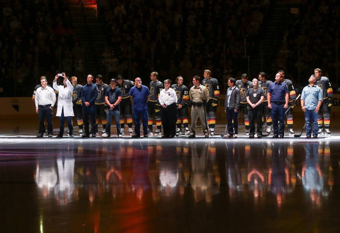 Members of the Vegas Golden Knights are introduced with first responders before playing the Ari ...