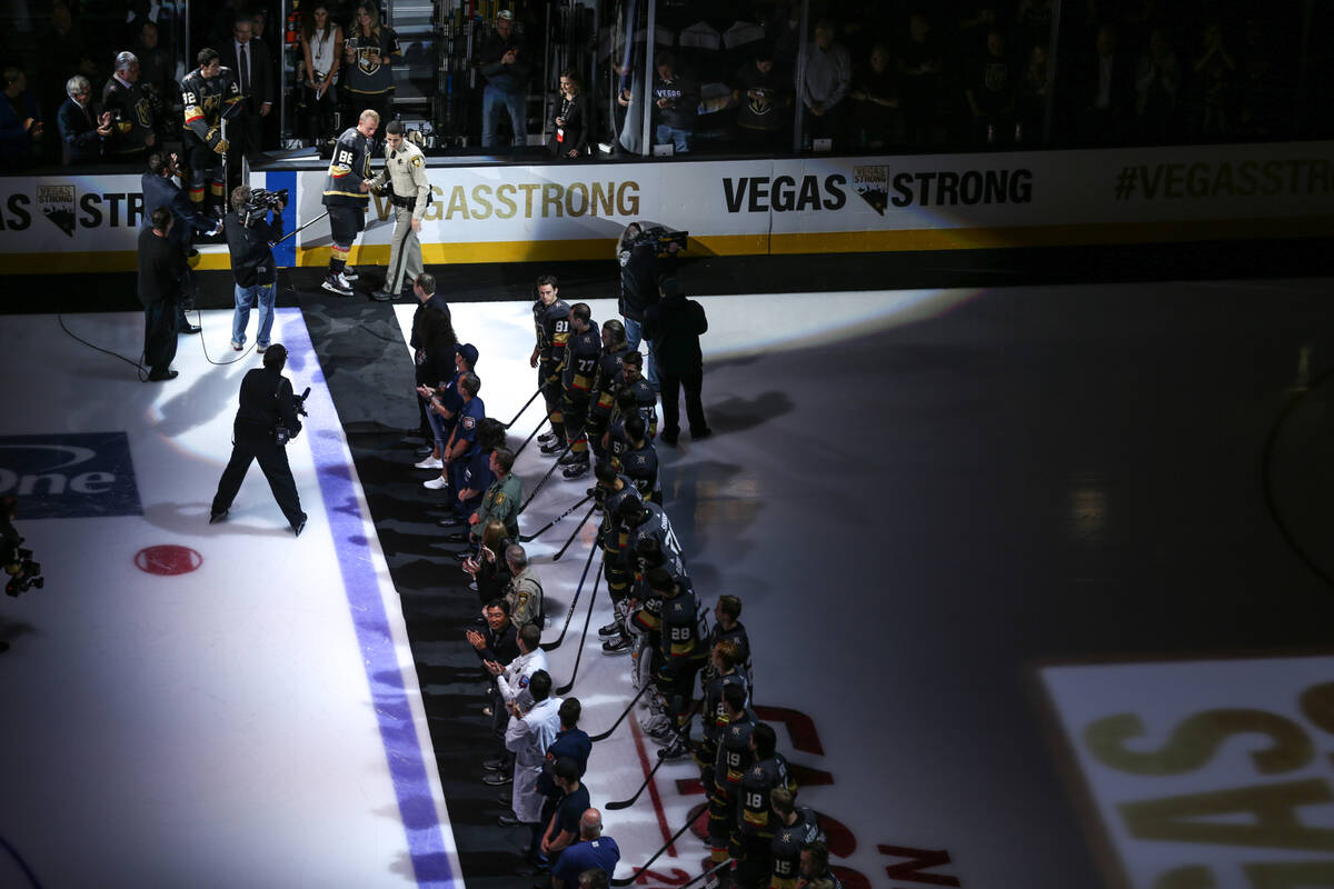 Victims and first responders of the Route 91 Harvest Festival shooting are honored before the s ...