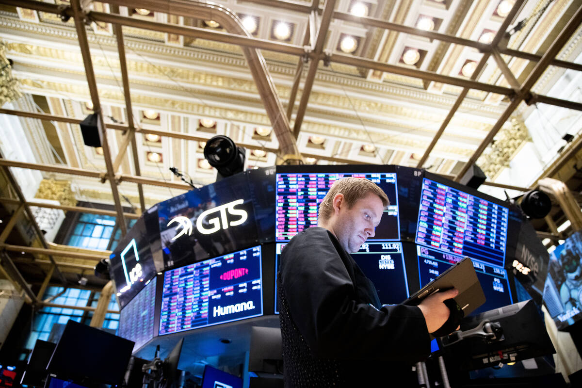 Traders work on the floor of the New York Stock Exchange on Tuesday, Sept. 13, 2022. (AP Photo/ ...