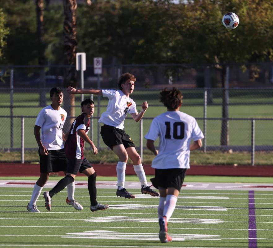 Las Vegas' Victor Mateo (4) heads the ball during a soccer game at Cimarron-Memorial High Schoo ...