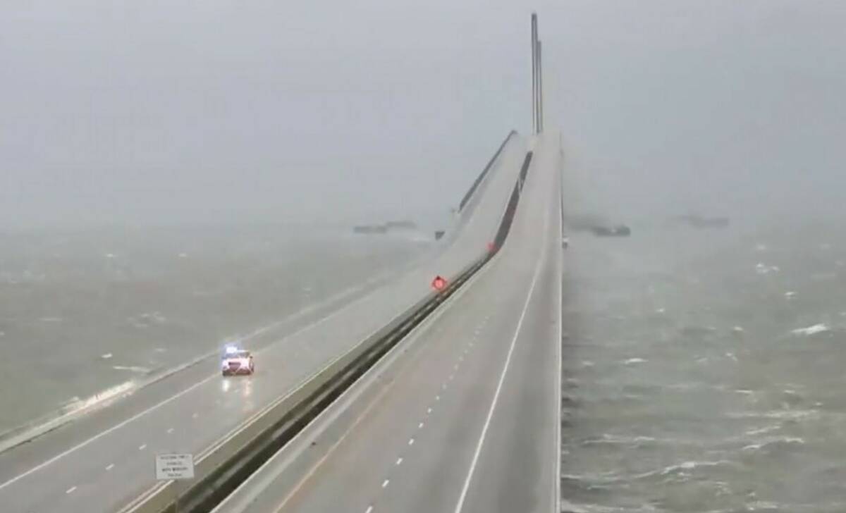 This image provided by FLDOT shows an emergency vehicle traveling on the Sunshine Skyway over T ...