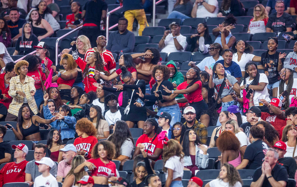 UNLV Rebels fans celebrate a score over the New Mexico Lobos during the second half of their NC ...