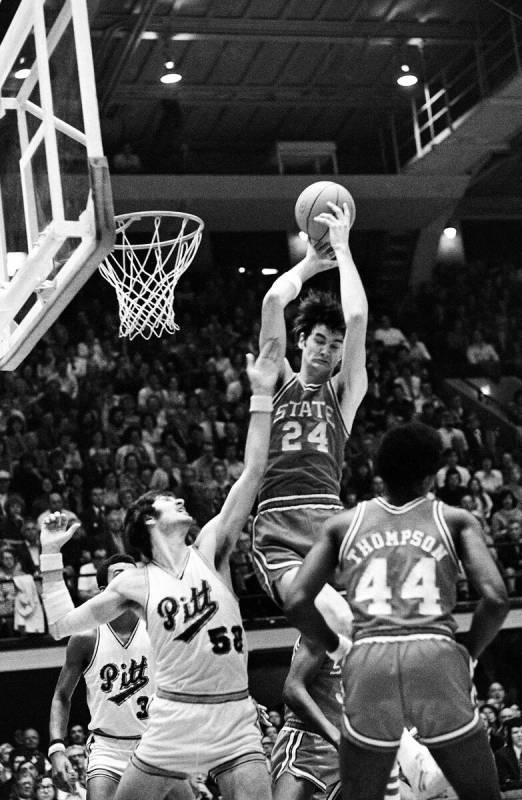 Tom Burleson (24), of North Carolina State, takes command of a rebound over Pittsburgh's Jim Bo ...