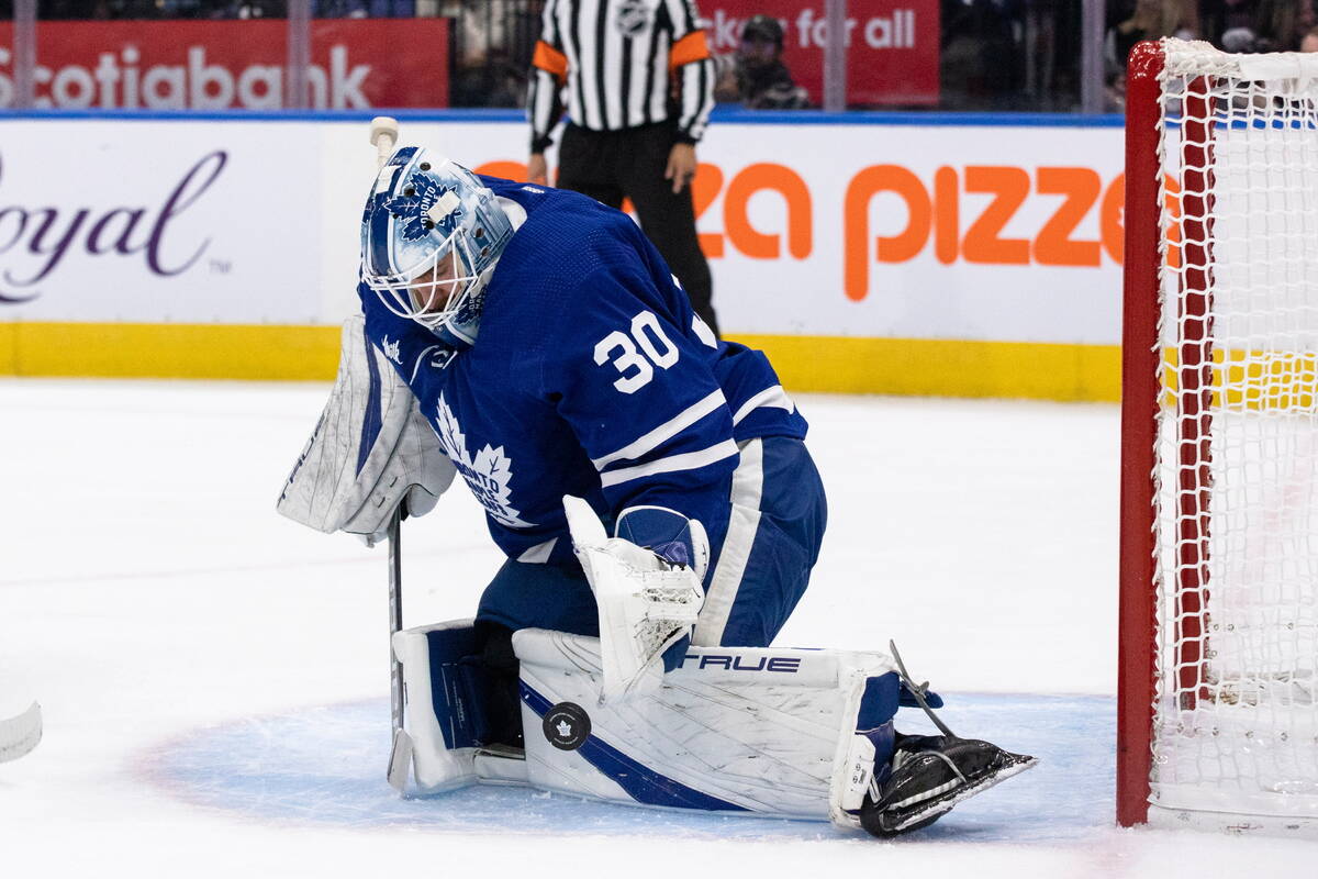 Toronto Maple Leafs goaltender Matt Murray (30) makes a save against the Montreal Canadiens dur ...