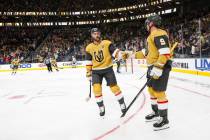 Golden Knights center Jack Eichel (9) celebrates his goal against the Los Angeles Kings with de ...