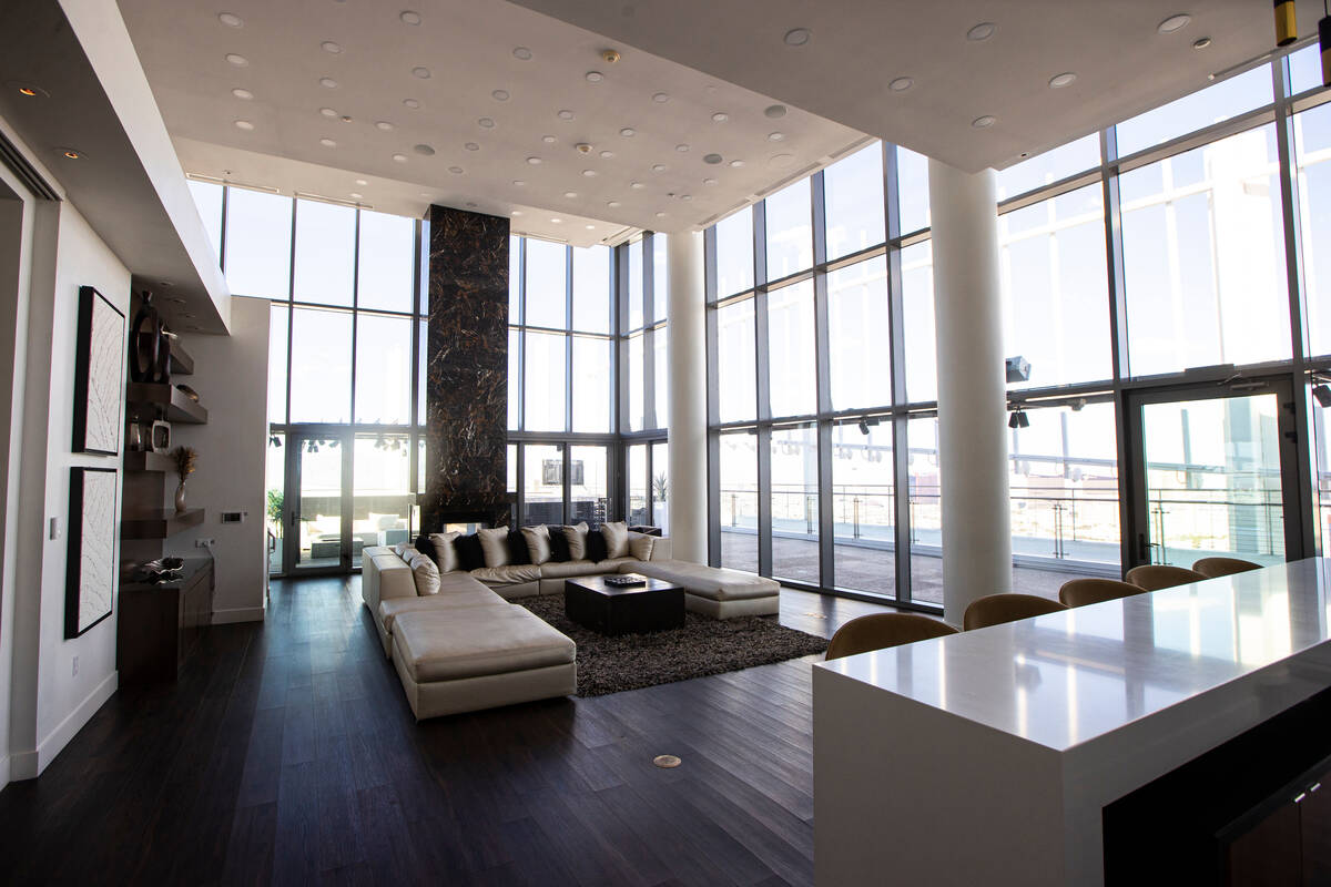 The living room Is seen at the Palms Place penthouse locator on the entire top floor of the bui ...