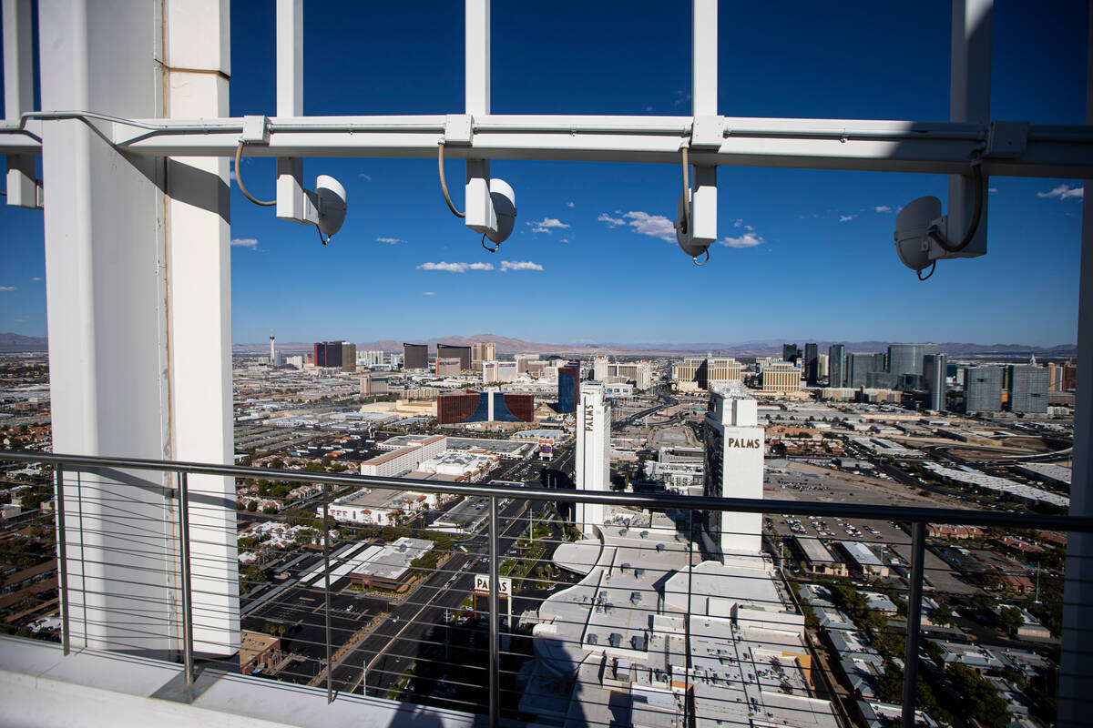 Views from the rooftop patio are seen at the Palms Place penthouse locator on the entire top fl ...