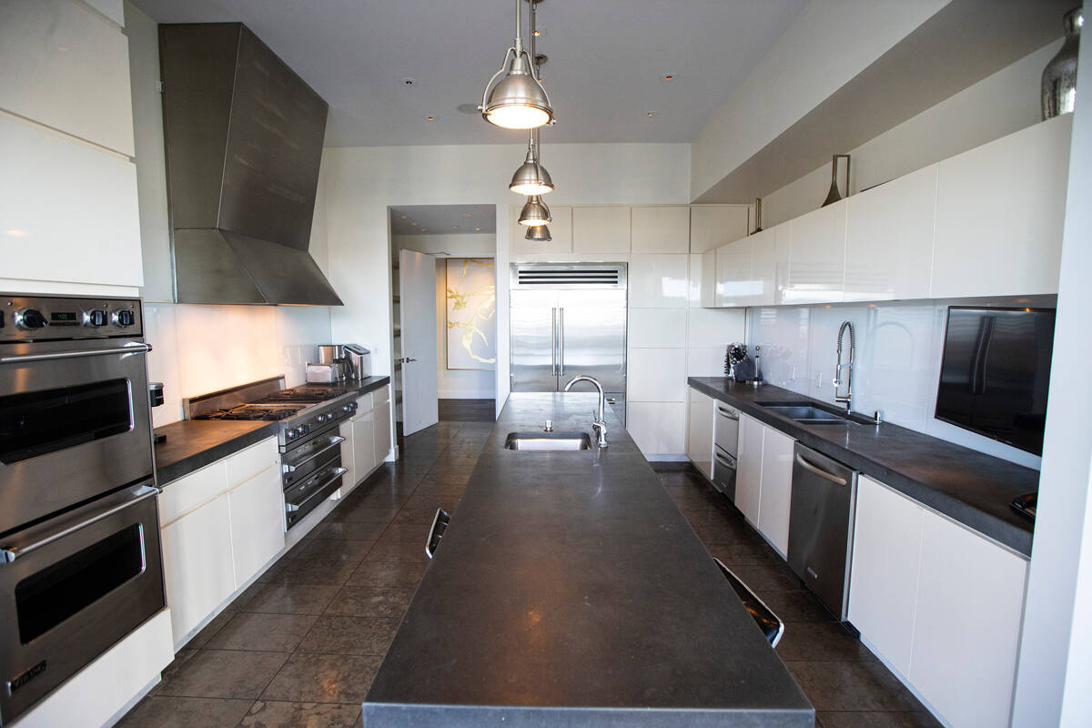 The kitchen Is seen at the Palms Place penthouse locator on the entire top floor of the buildin ...