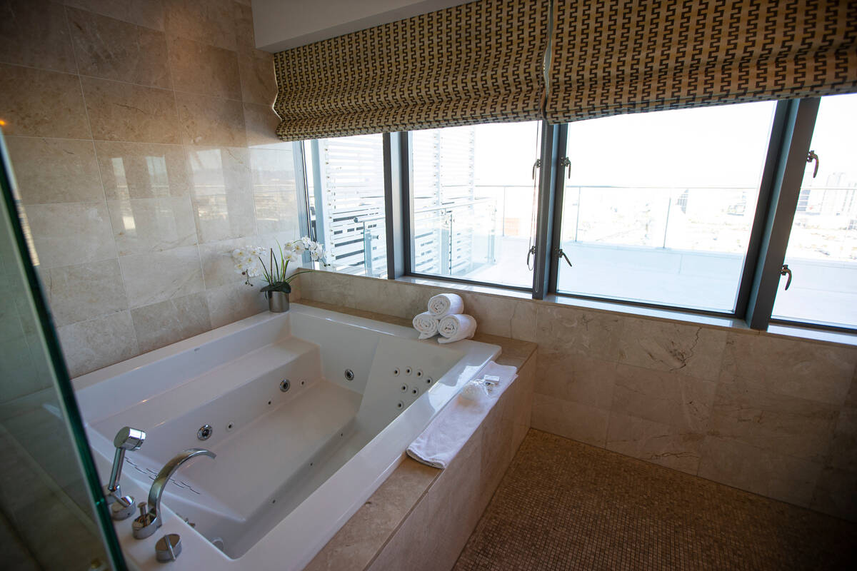 The master suite bathroom Is seen at the Palms Place penthouse locator on the entire top floor ...