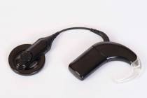 Cochlear implant device for deaf or hearing impaired people