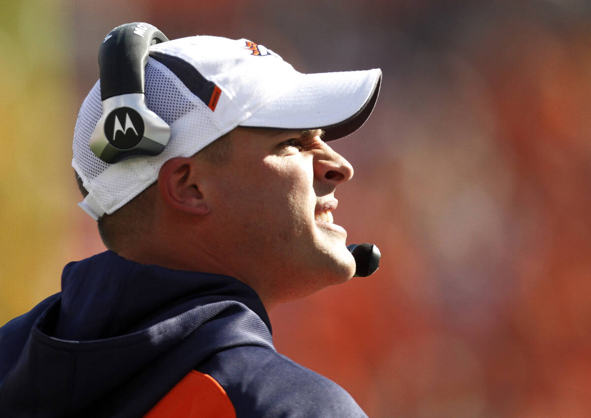 Denver Broncos head coach Josh McDaniels looks on against the New York Jets during the first ha ...