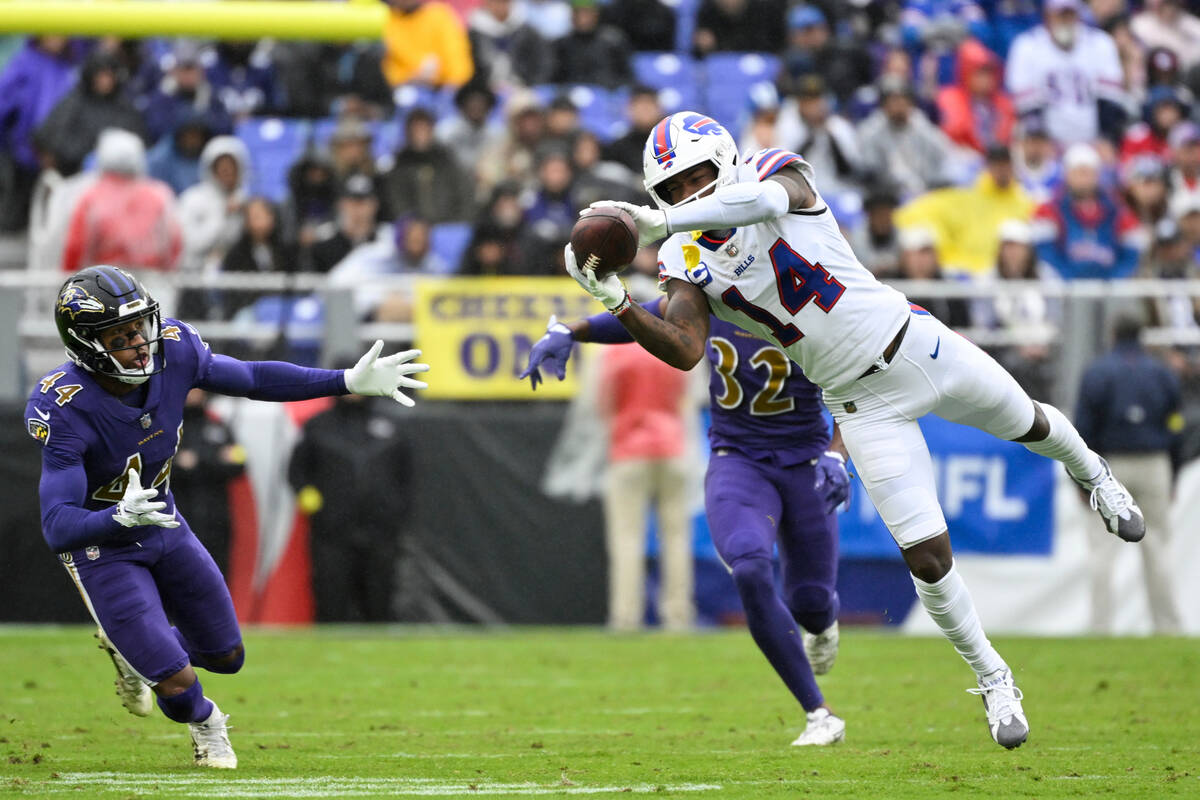 Buffalo Bills wide receiver Stefon Diggs (14) catches the ball against Baltimore Ravens cornerb ...