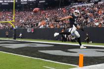 Raiders wide receiver Mack Hollins (10) jumps up to keep the punted ball out of the end zone du ...