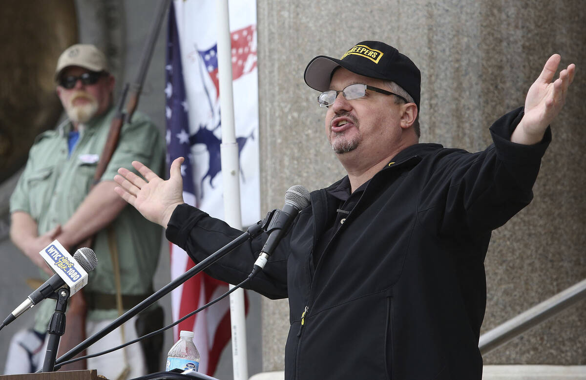FILE - Stewart Rhodes, the founder of Oath Keepers, speaks during a gun rights rally at the Con ...