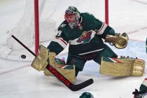 Minnesota Wild goalie Marc-Andre Fleury deflects a shot during the first period of the team's N ...