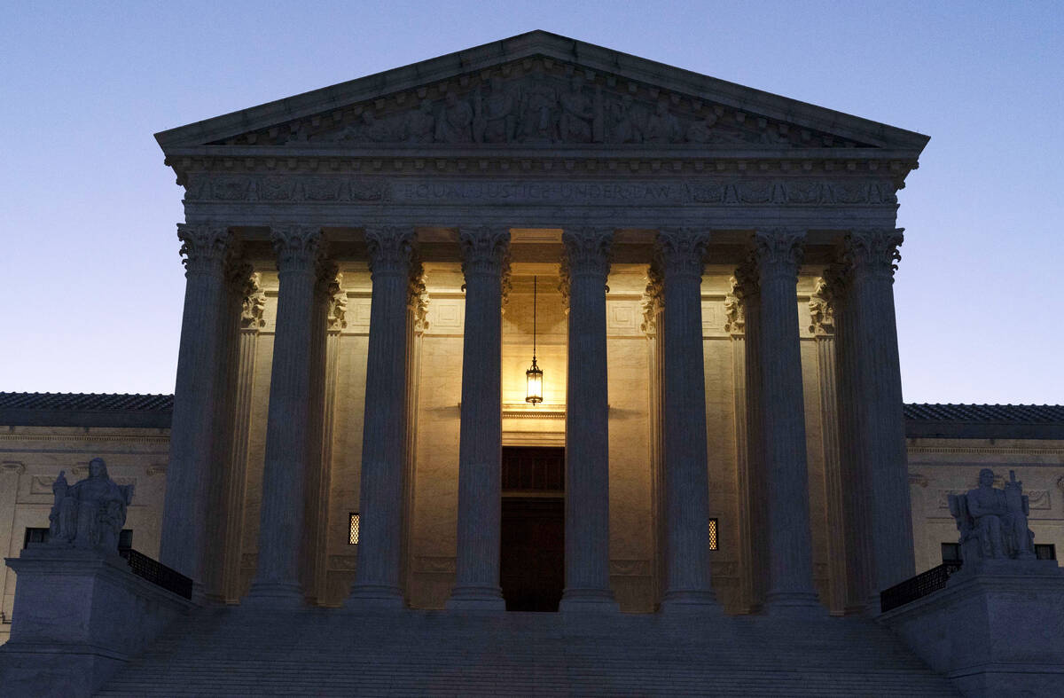 FILE - The U.S. Supreme Court is seen before sunrise on Capitol Hill in Washington, March 21, 2 ...