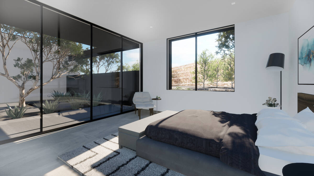 One of four en suite bedrooms. (g Architecture)