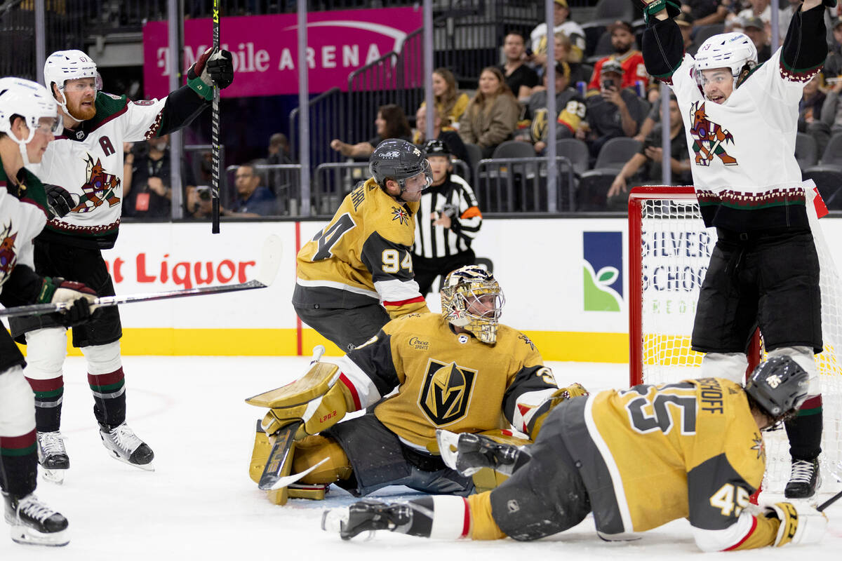 Coyotes left wing Lawson Crouse (67) and Coyotes forward Matias Maccelli (63) celebrate a goal ...