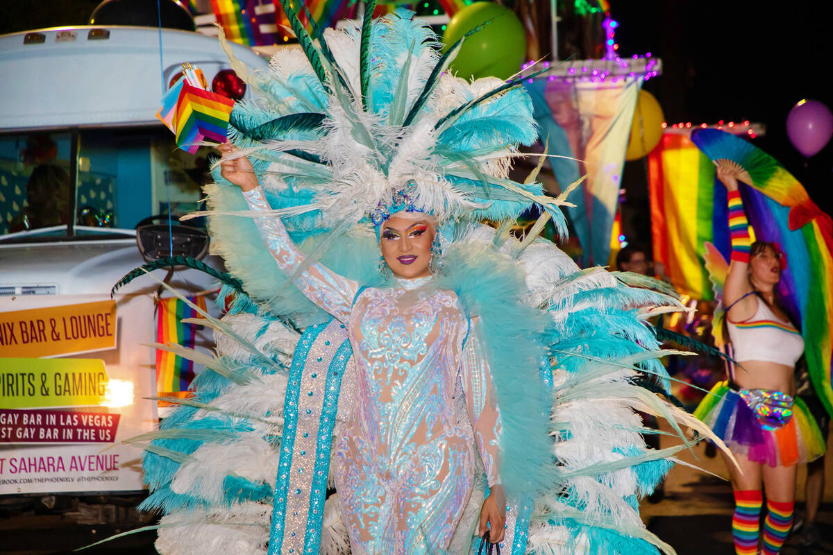 A member of the Phoenix Bar float in the annual downtown Pride parade on Friday, Oct. 7, 2022, ...