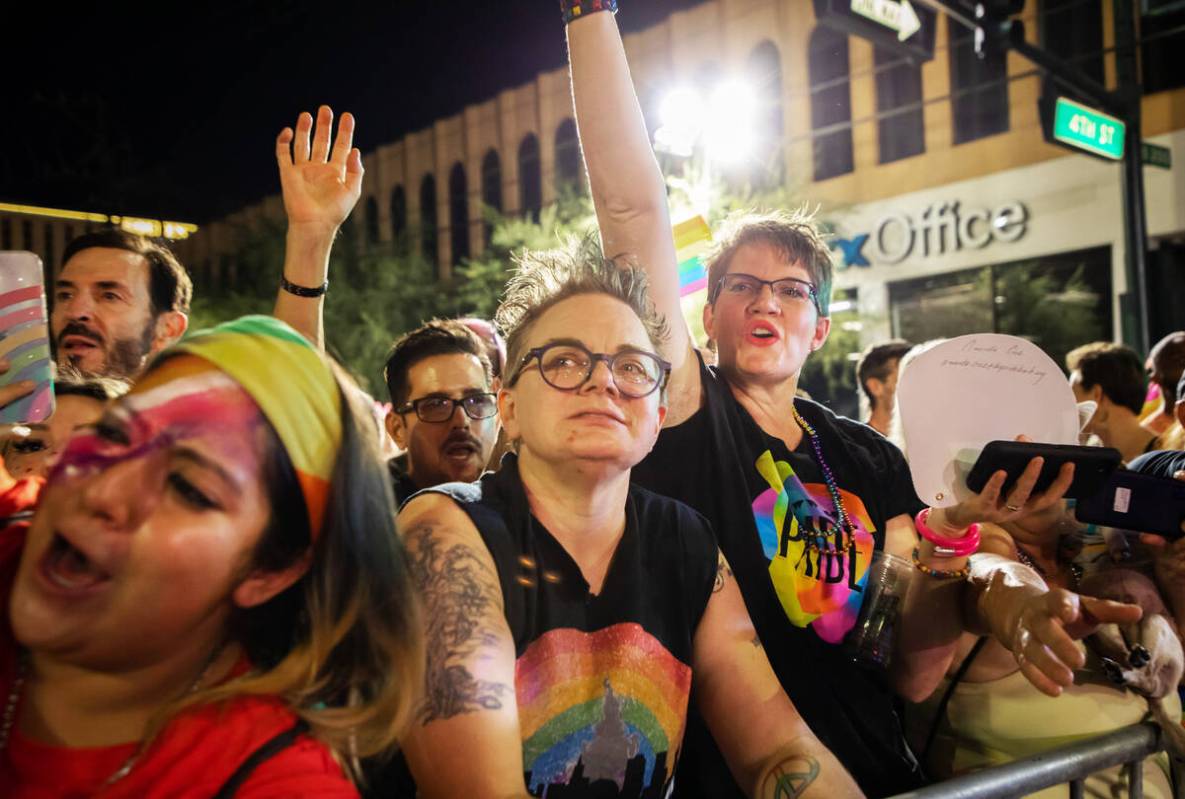 People watch the annual downtown Pride parade on Friday, Oct. 7, 2022, in Las Vegas. (Amaya Edw ...