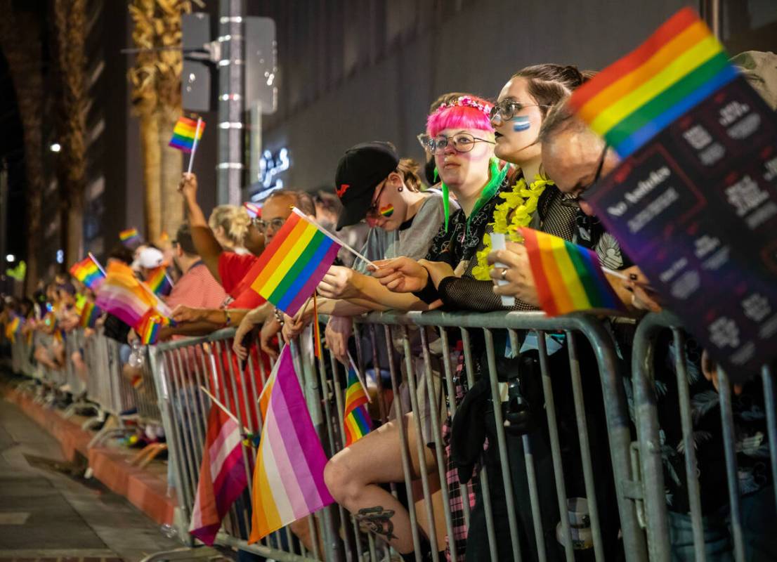 People watch the annual downtown Pride parade on Friday, Oct. 7, 2022, in Las Vegas. (Amaya Edw ...