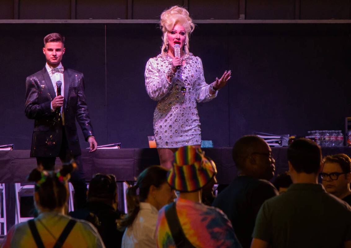 Ricky Cornish, left, and Andrew Ryan, right, host the annual downtown Pride parade on Friday, O ...